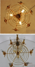 Duży kryształowy żyrandol salonowy. Stara lampa z kryształami.