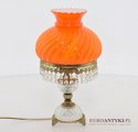 Starodawna lampa kryształowa z pomarańczowym kloszem