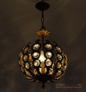 Antyczna lampa w kształcie kuli. Oświetlenie Belle Epoque.