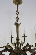 Duży srebrno złoty zabytkowy żyrandol barokowy. Antyczne lampy.